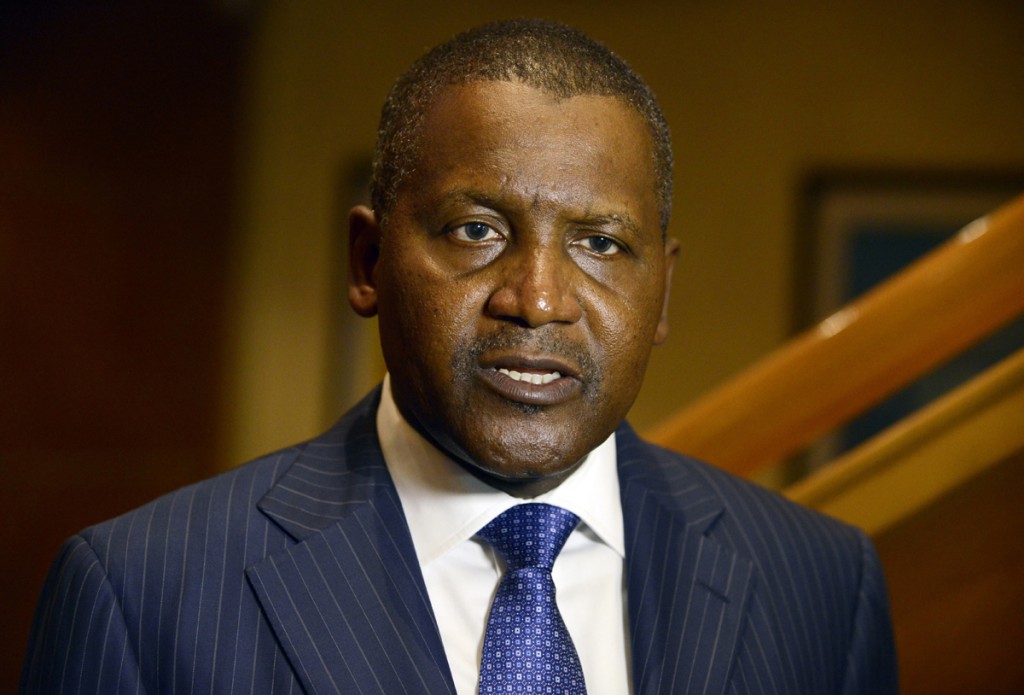 Business magnate man Aliko Dangote, ranked by Forbes Magazine as the richest man in Africa, speaks during a send off ceremony of 250 Nigerian health workers on a mission to fight Ebola virus in affected West African countries and launch of African initiative operating under the hash tag #AfricaAgainstEbola in Lagos on December 3, 2014. Two hundred and fifty volunteer Nigerian medical corps under the auspices of the African Union Support to Ebola Outbreak in West Africa (ASEOWA)  were given a send off to fight Ebola Virus Diseases in the affected three West African countries of Liberia, Sierra Leone and Guinea. The African Union, which is collaborating with the private sector to raise funds to support and strengthen the Unions response to the crises, is sending more than 1000 health workers before Christmas. AFP PHOTO/PIUS UTOMI EKPEI        (Photo credit should read PIUS UTOMI EKPEI/AFP/Getty Images)