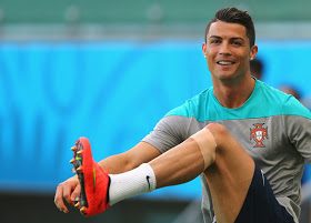 SALVADOR, BRAZIL - JUNE 15: Cristiano Ronaldo stretchs during the Portugal training session ahead of the 2014 FIFA World Cup Group G match between Germany and Portugal held at the Arena Fonte Nova on June 15, 2014 in Salvador, Brazil. (Photo by Martin Rose/Getty Images)