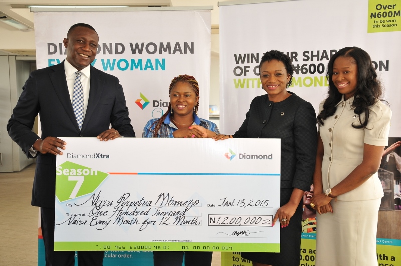 Head, Direct Banking, Diamond Bank PLC, Jude Anele; DiamondXtra Salary-4-Life winner, Duru Chukwuebuka Francis; and Head, Retail Banking Directorate, Diamond Bank PLC, Aisha Ahmad at the Diamondxtra Season 7 Year-End/ Diamond Woman Special Draw prize presentation ceremony, held at the Bank’s corporate head office recently.