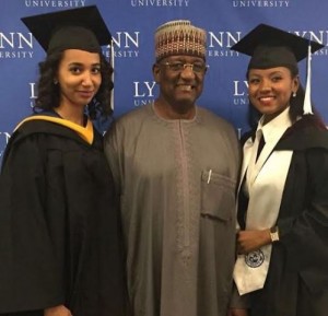 Mohammed Indimi with his daughters at their graduation