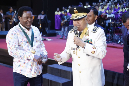 The President of the Generals, Admirals and the Officers of the Armed Forces of Peru, General Juan Gonzalez Sandoval, bestows a military decoration upon T.B. Joshua. (PRNewsFoto/Emmanuel TV)