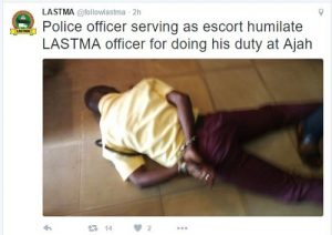see-the-moment-policeman-humiliated-lastma-officer-in-lagos-state-photos-1
