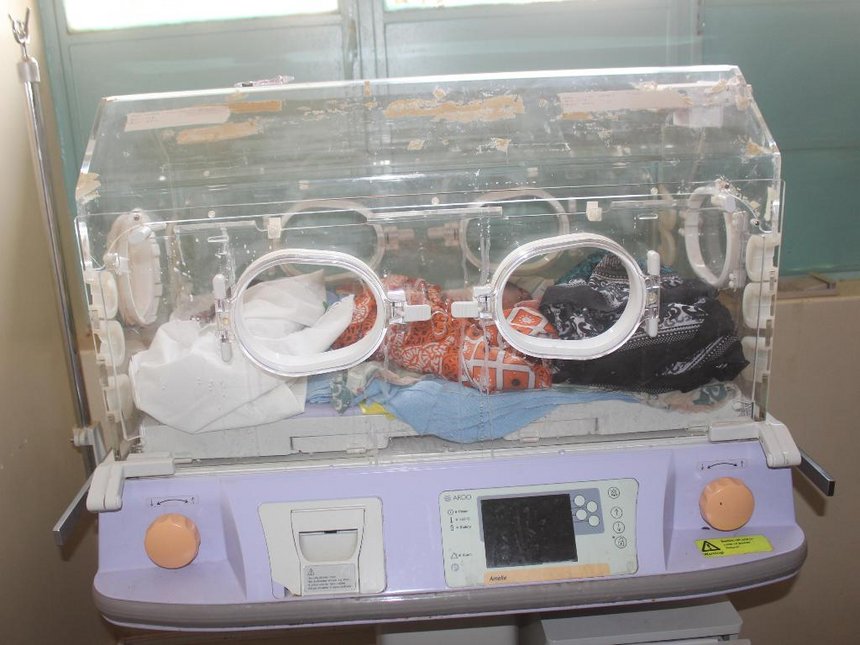 New born baby in an incubator