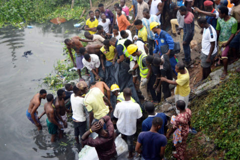 Crowd Gathered Around Pond Where School girls drown