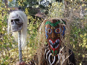 Nigerian witch doctor wearing mask