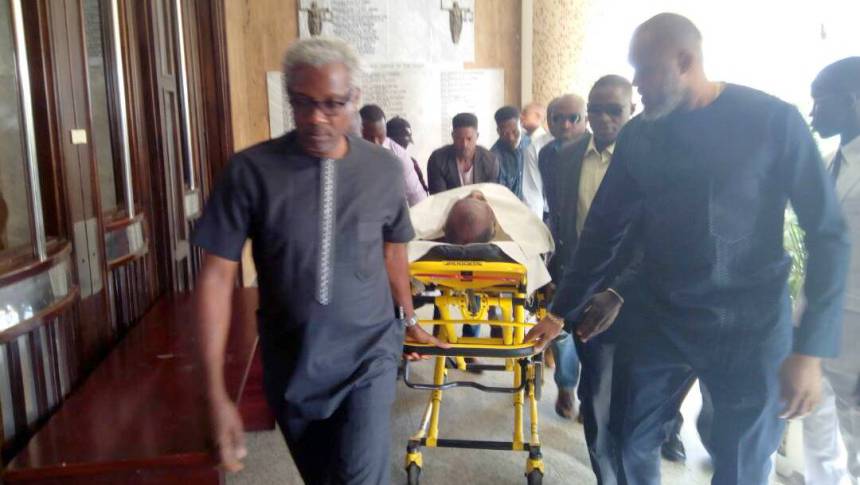 Metuh arrives at court on a stretcher
