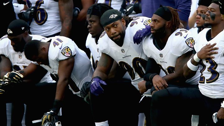 NFL players kneeling during the US National Anthem