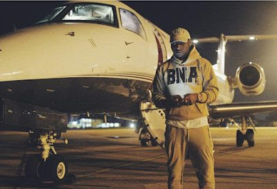 Photo of Davido in front of his dad's Private Jet