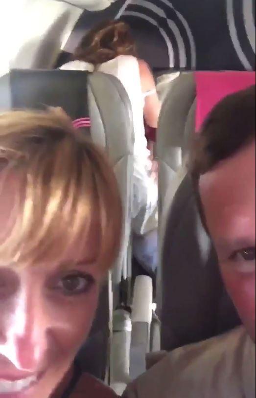 Couple having sex on plane
