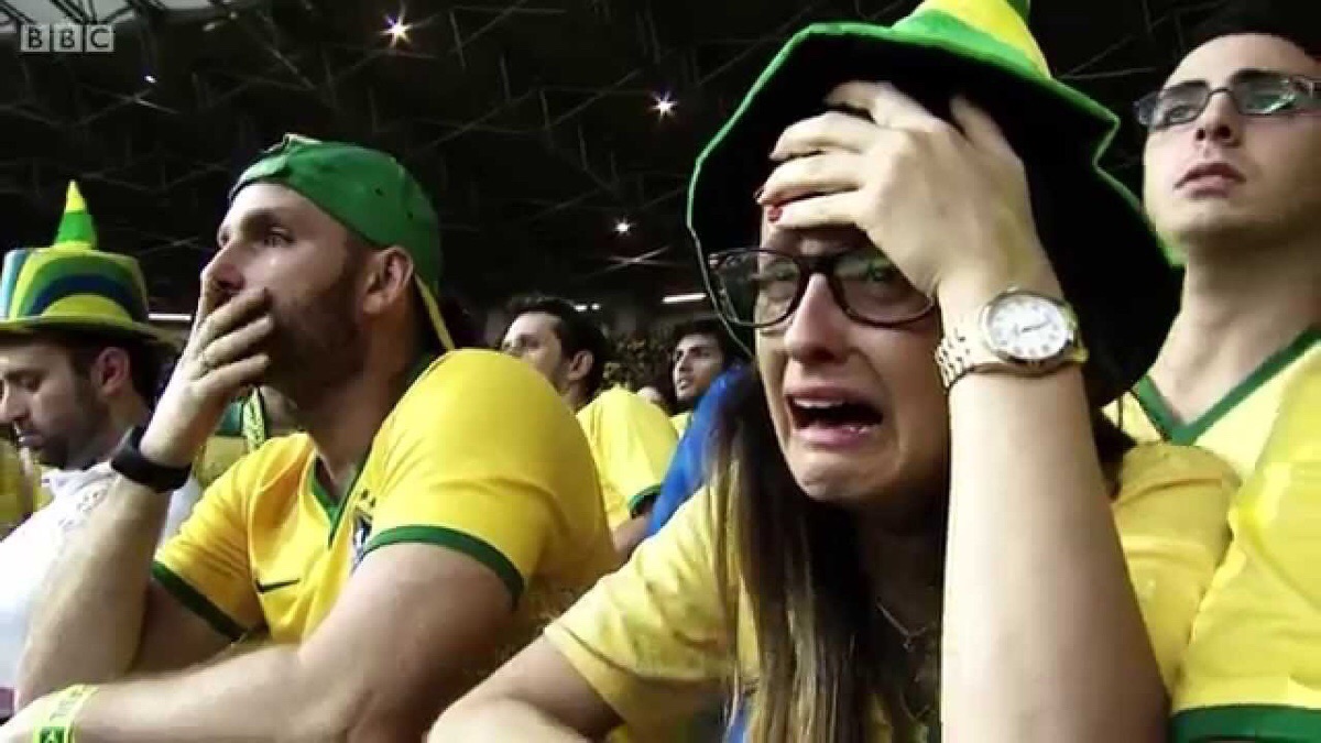 Brazilian fan weeping at the 2014 World Cup 