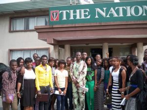 Photo: With Mass Communication students during a visit to The Nation