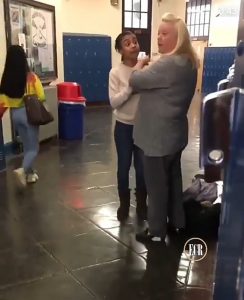 Video: Female teacher and student resolve their differences in a physical combat