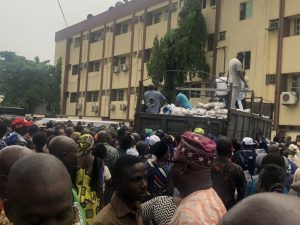 Video: Civil servants trample on one another over bags of rice distributed by Sanwoolu