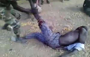 Graphic Video: Soldier yanks off man’s leg, brandishes it in his face thereafter