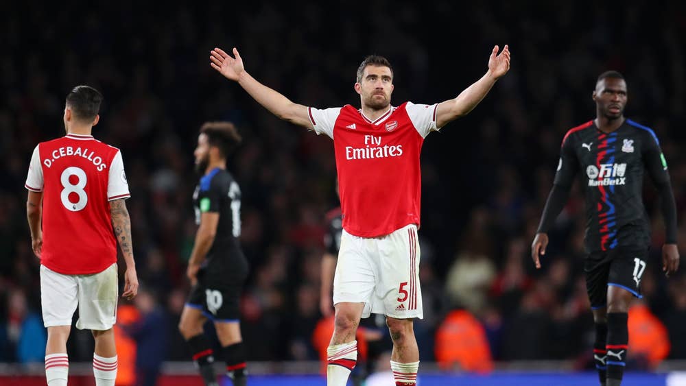 Arsenal struggle as Palace forces draw