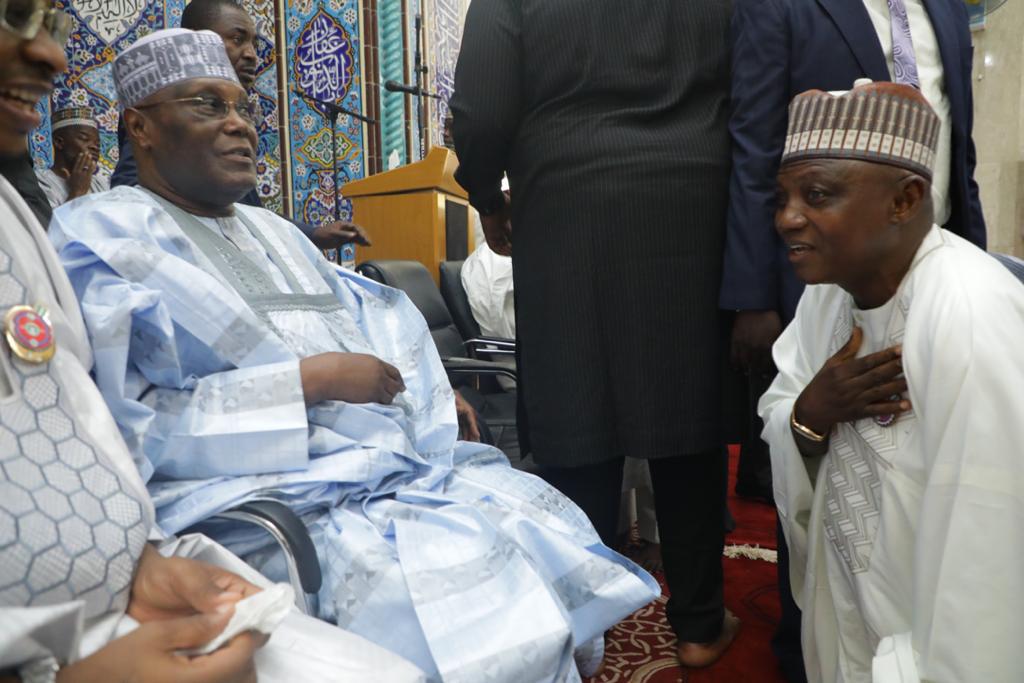 Buhari's Media Aide, Garba Shehu Kneels Before Atiku