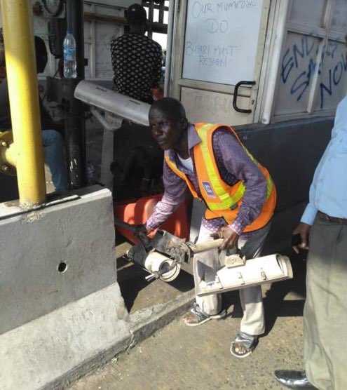 Technicians uninstall security cameras at Lekki Toll gate