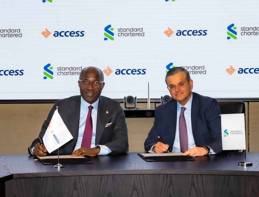 Roosevelt Ogbonna, Group Managing Director, Access Bank Plc, and Sunil Kaushal, Regional CEO, Africa & Middle East, Standard Chartered, at the signing of the agreement