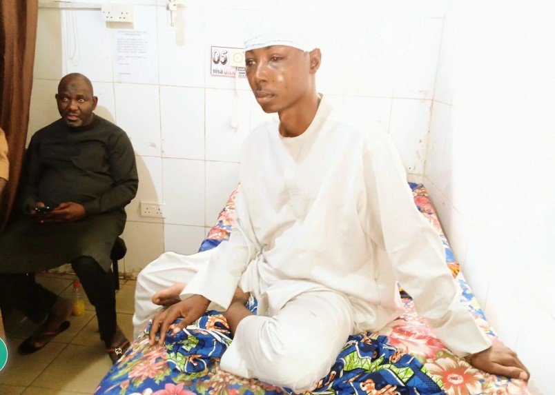Mr Shehu Mohammed receiving treatment for head and eye injuries at Garki Hospital, Abuja